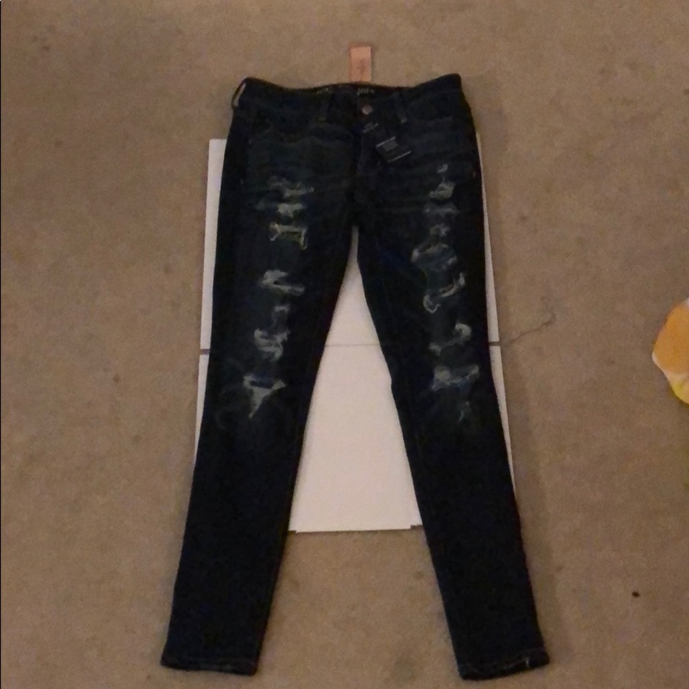 Dark wash skinny Jeans, size 4, never worn